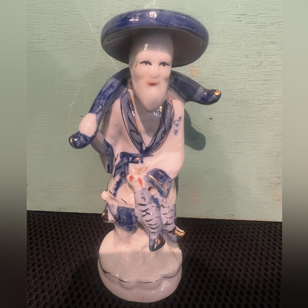 Blue and White Ceramic Figurine